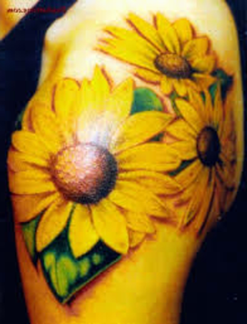 Bunga tato dan simbolisme bunga matahari mereka