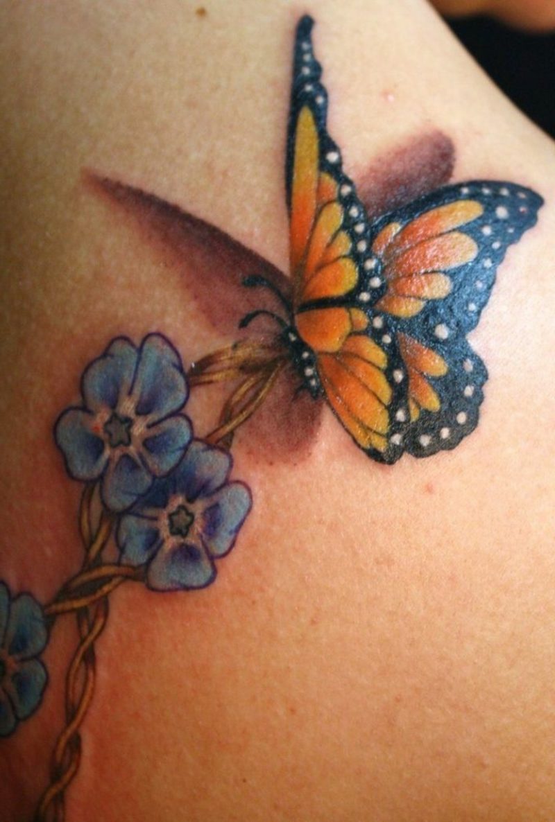 Fjäril tatuering monark fjäril och blomma