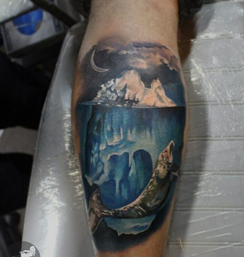 łydka tatuaż iceberg