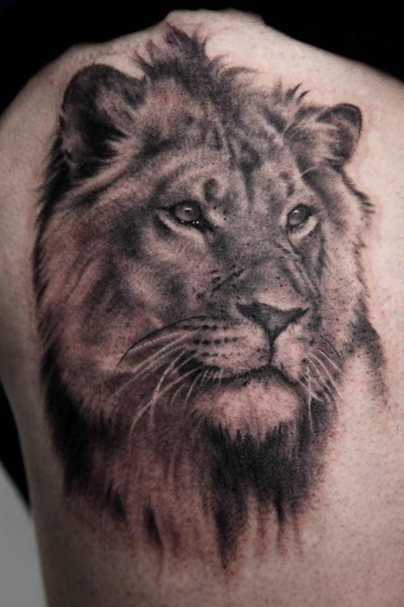 Symbol for styrke løve tatovering