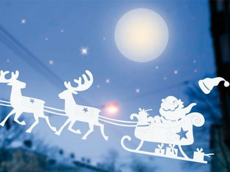 Okno obrázkov pre vianočné Santa Claus a jeho sobov