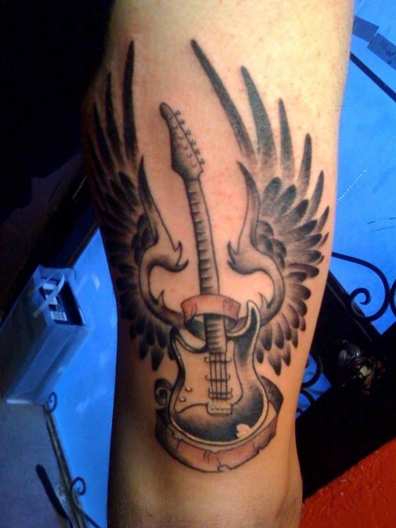 clef tetovanie gitara s krídlami