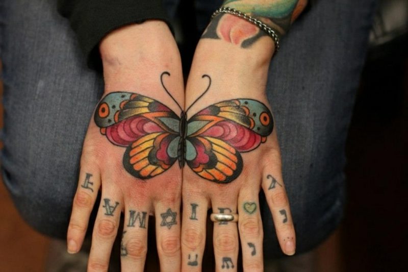 Tattoo butterfly hands top